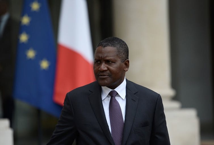 Aliko Dangote leaves the French Elysee presidential palace after a meeting with the president in 2016.
Stephane de Sakutin/AFP via Getty Images