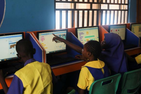 Students enrolled in a special STEM program for children at the Knosk Secondary School attend a computer class, in Abuja, Nigeria, on February 18, 2022. REUTERS/Afolabi Sotunde