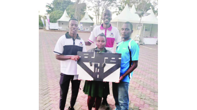 Part of the University of Zimbabwe students involved in the development of a smart traffic management system