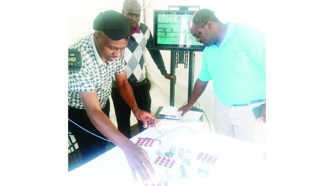 UZ Computer Science students showcase their wireless rail prototype design at the UZ Research Innovation & Industrialisation Week